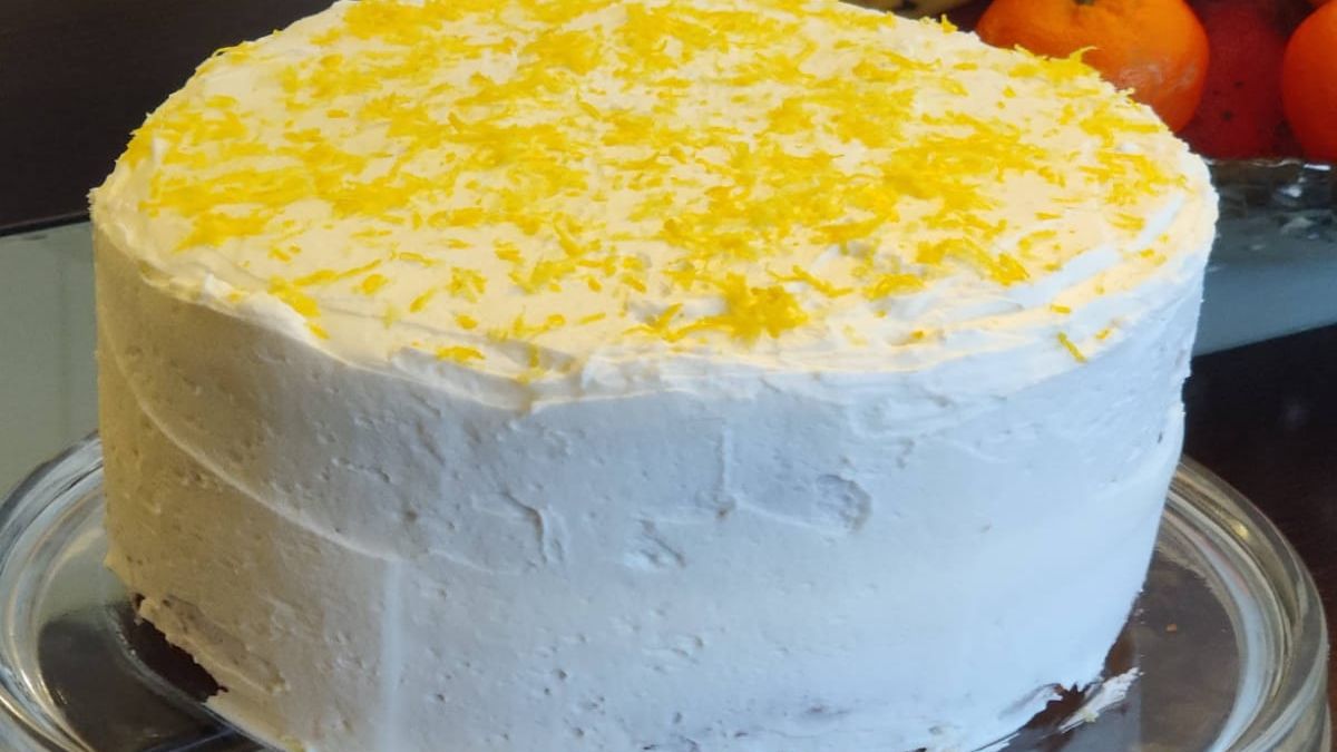 a whole lemon buttermilk cake on a platter
