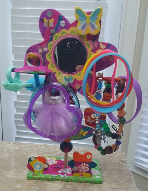 A craft kids called Word Worx that contains pieces of a jewelery stand