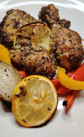Sheet pan lemon and chicken with red peppers and onions