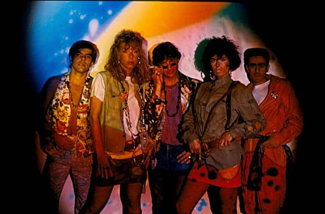 a group of people from the 80s