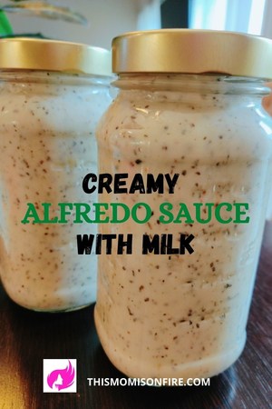 alfredo sauce in 2 mason jars. This is a Pinterest pin.
