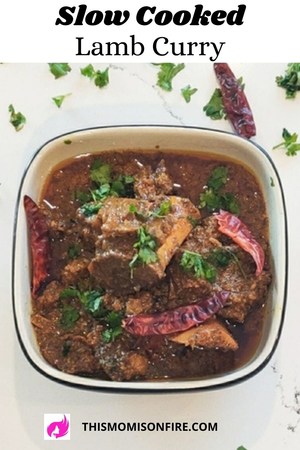 a close up and top view of a bowl of lamb curry. This is a Pinterest pin.