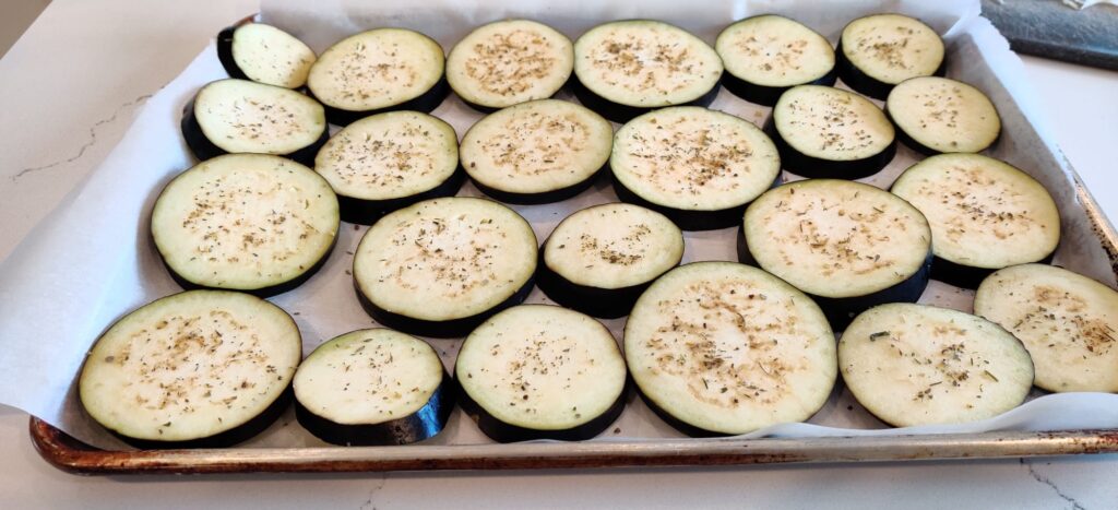eggplant slices on a baking tray