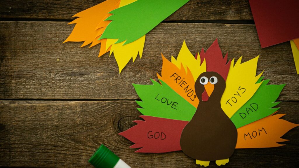 Thanksgiving craft, a turkey with gratitude notes on his feathers. 