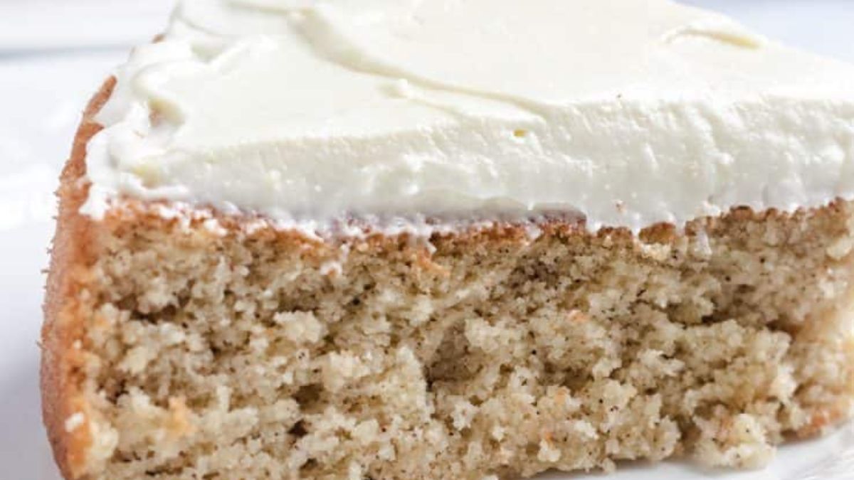 a piece of keto spice cake with frosting on top