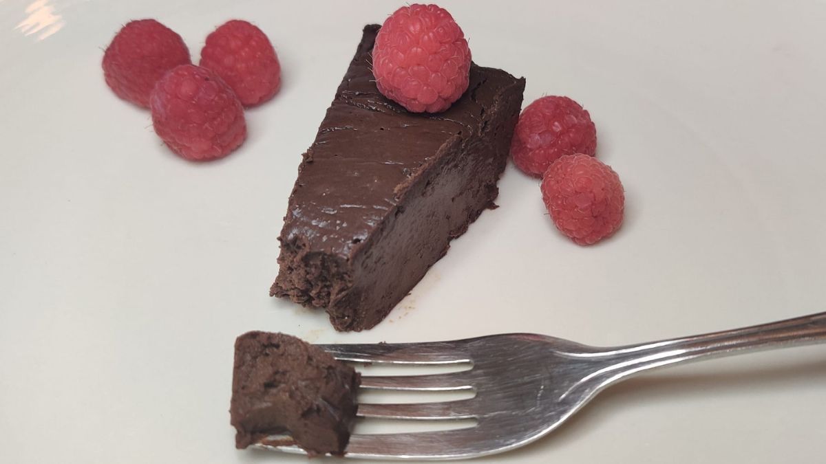 chocolate cake with raspberries on top