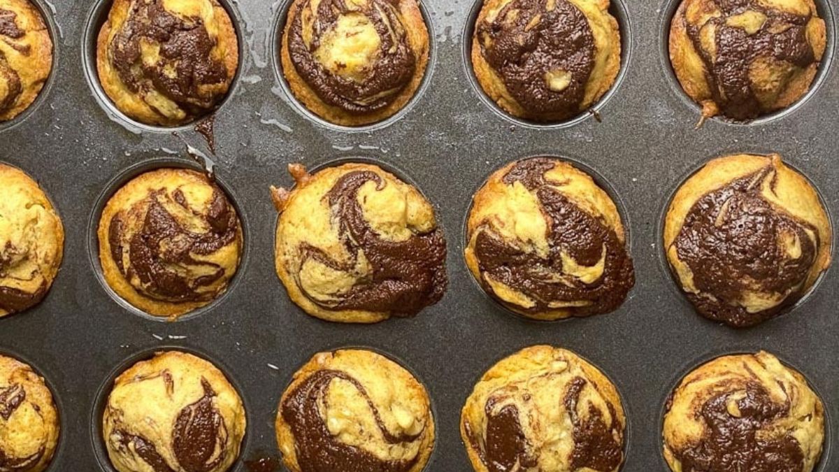 nutella muffins in a muffin tin