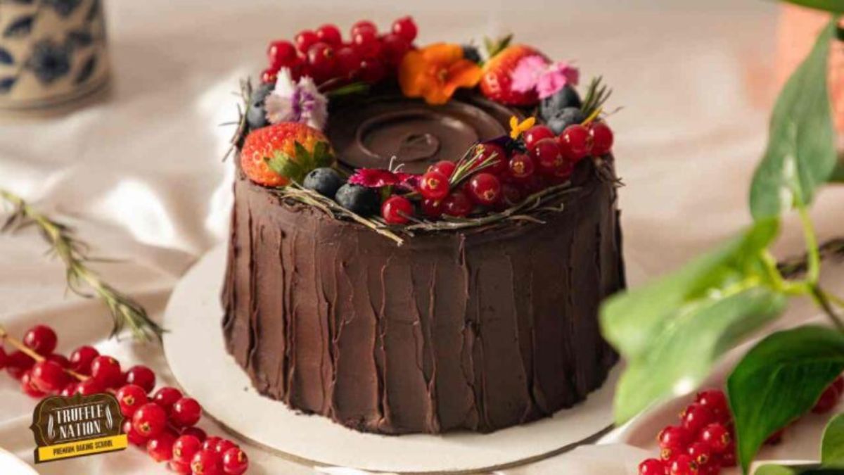 chocolate blueberry cake with berries on top