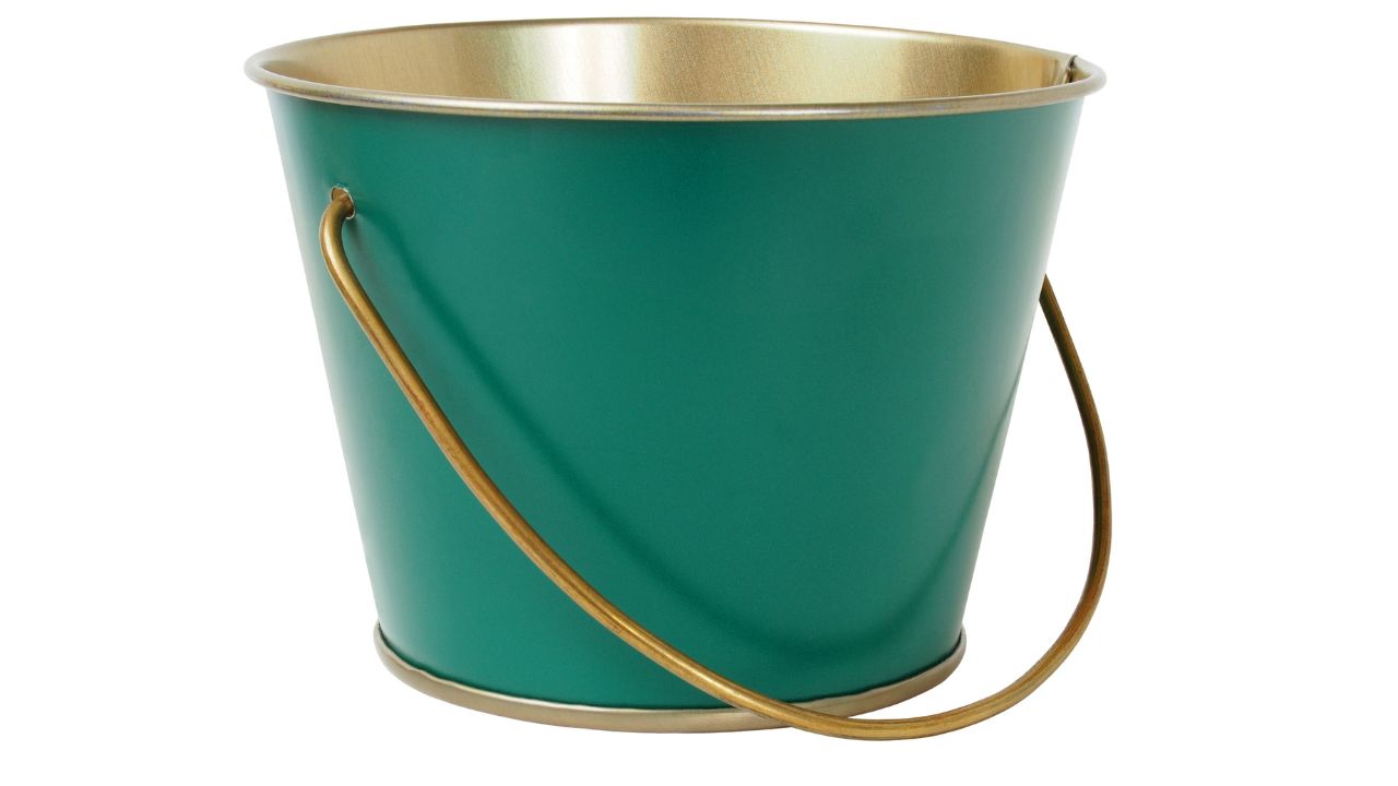 green and brass colored bucket