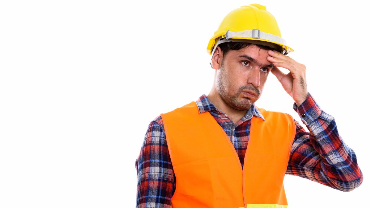 construction worker looking stressed