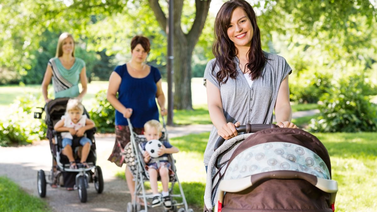 three moms with kids in strollers