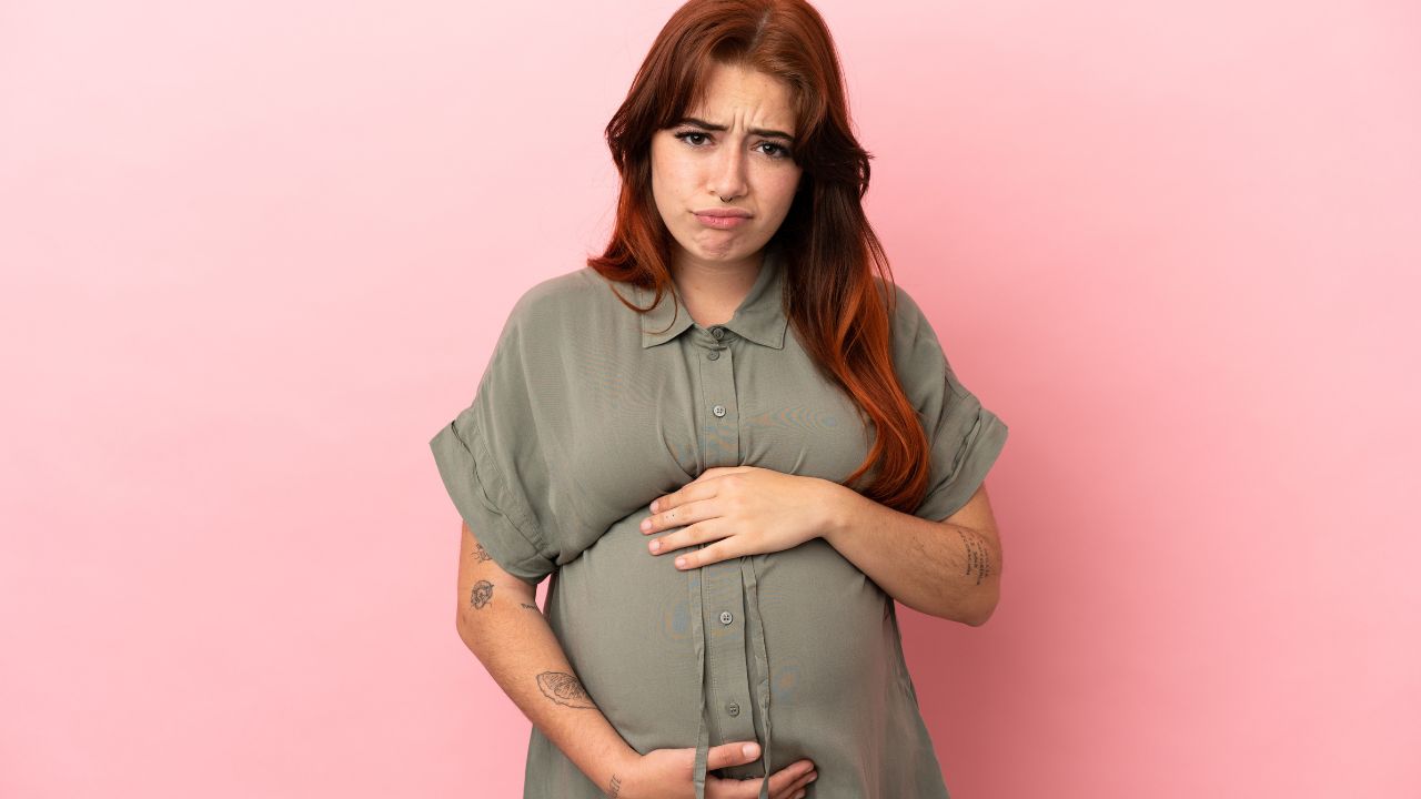 pregnant woman looking upset