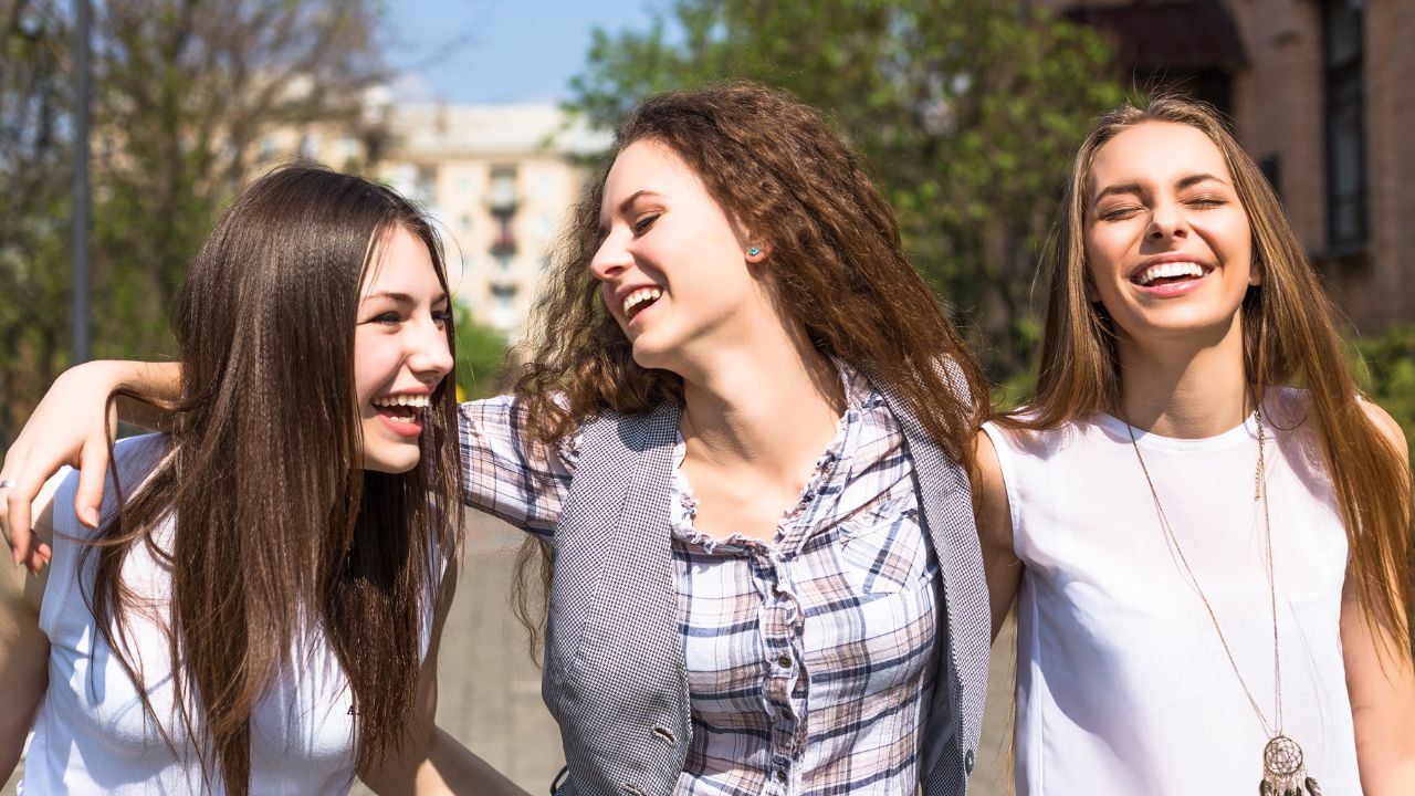 three women together smiling