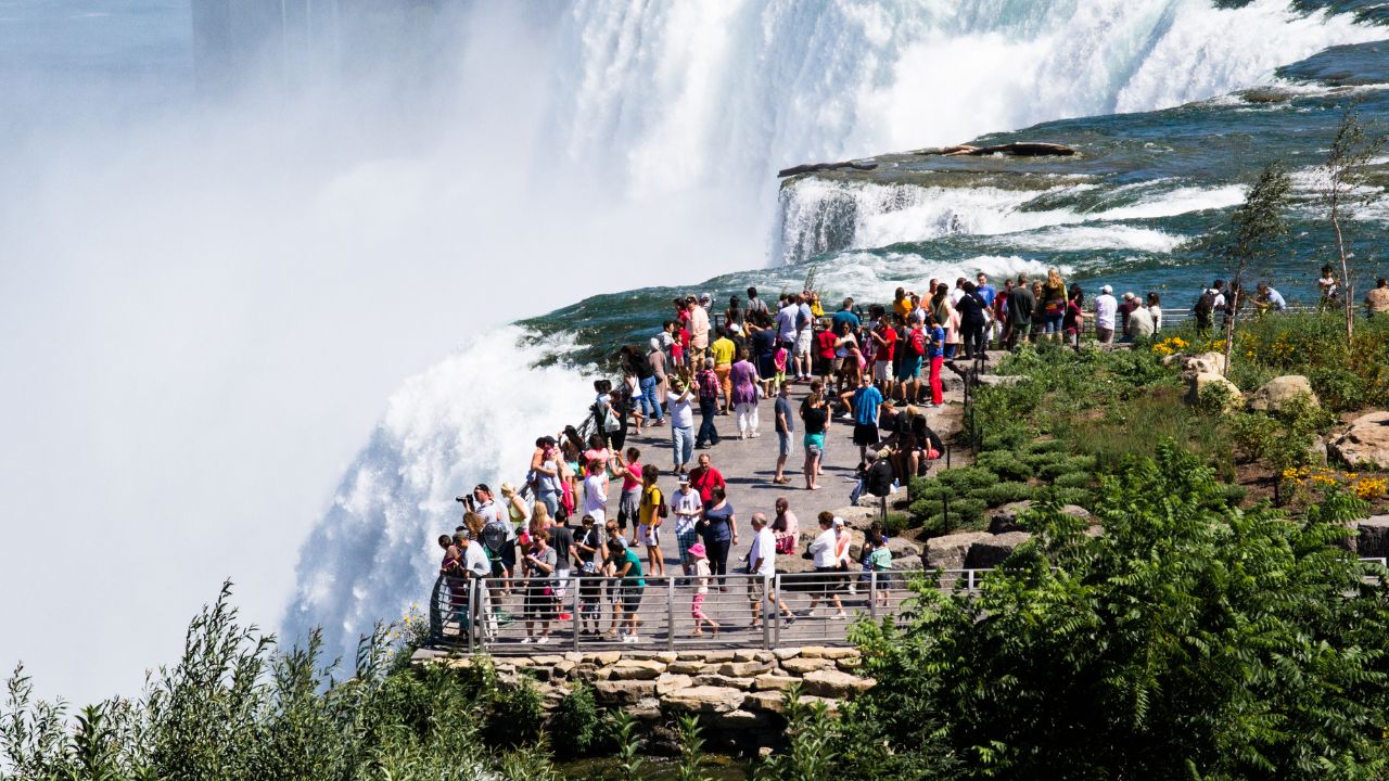 people standing by Niagara Falls