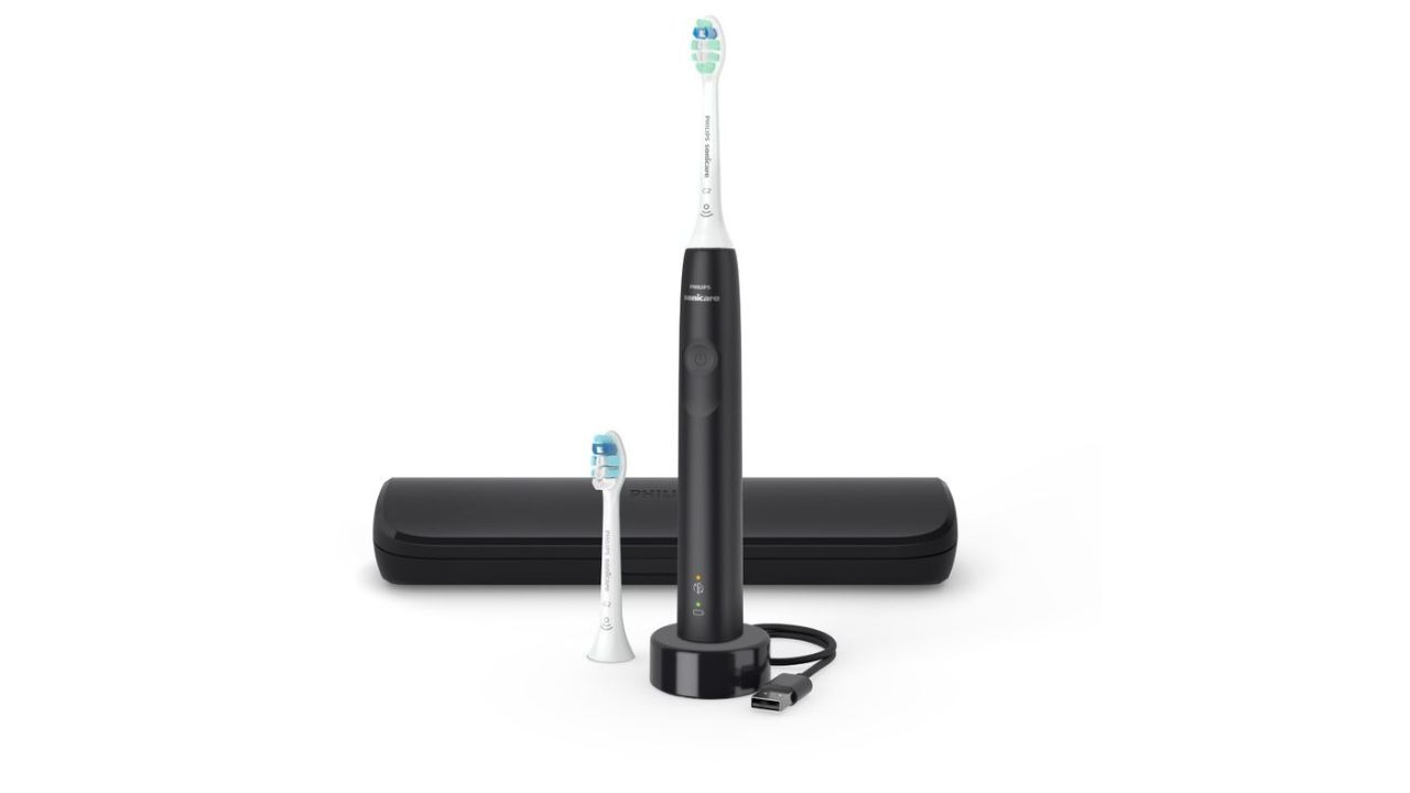 Phillips Sonicare electric toothbrush on charger with replacement head
