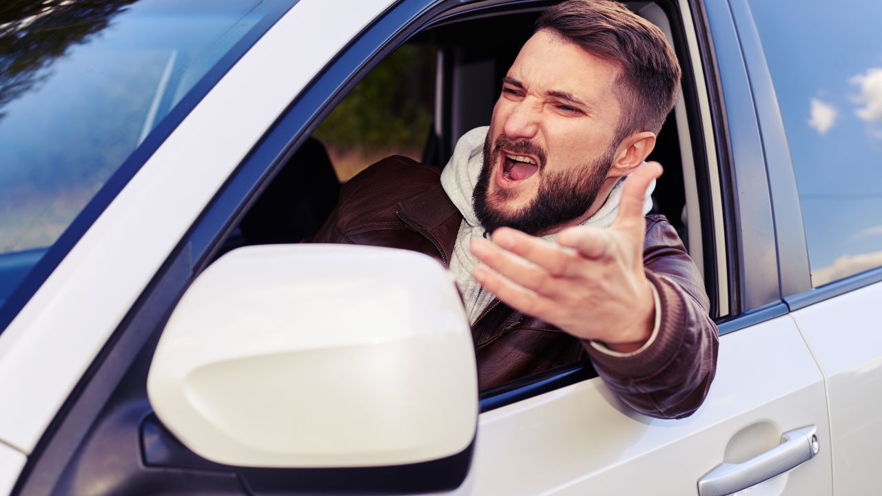 man yelling from car
