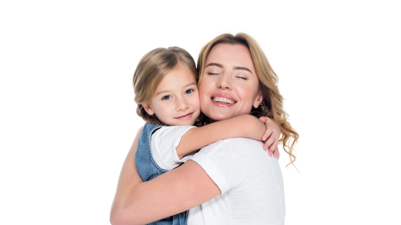 woman hugging daughter