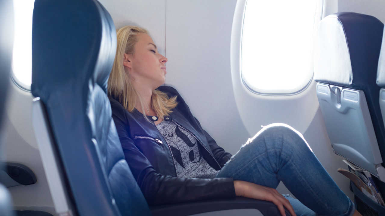 woman beside an empty seat