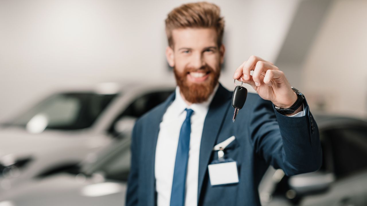 man holding car keys, car salesman