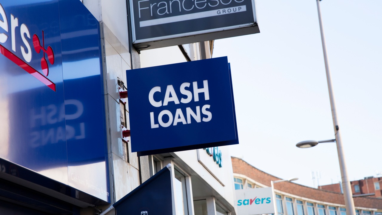 a storefront sign for cash loans