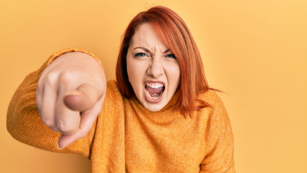 woman angry and pointing her finger