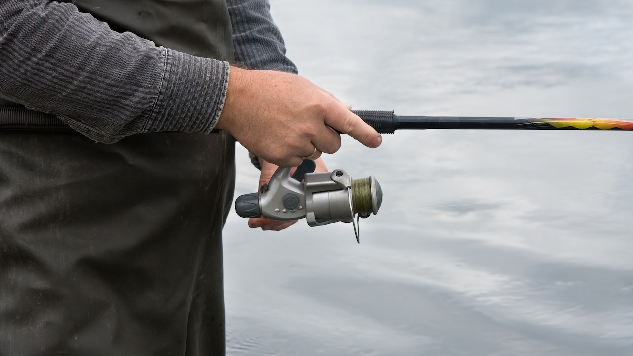 person holding a fishing rod