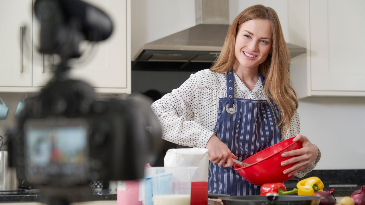 woman cooking in front of the camera