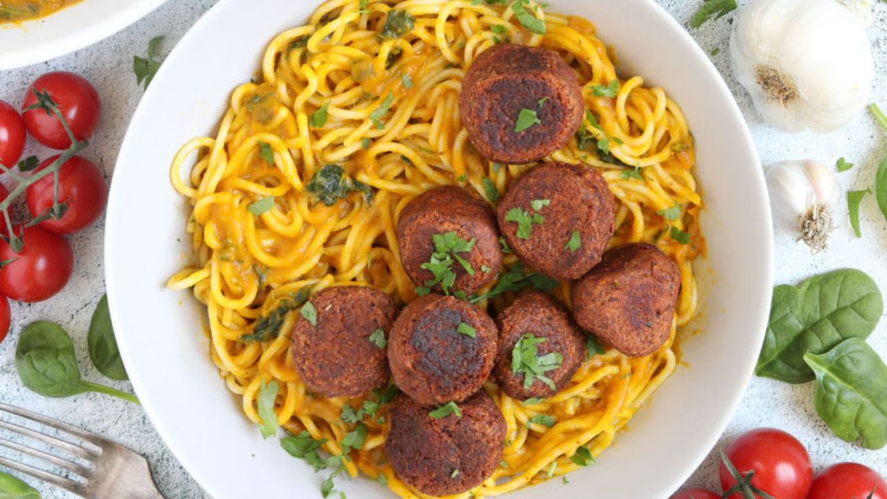 butternut squash pasta sauce in spaghetti and meatballs in a bowl