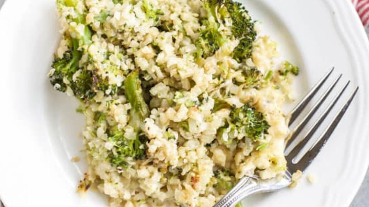 cauliflower and broccoli casserole on a plate with a fork